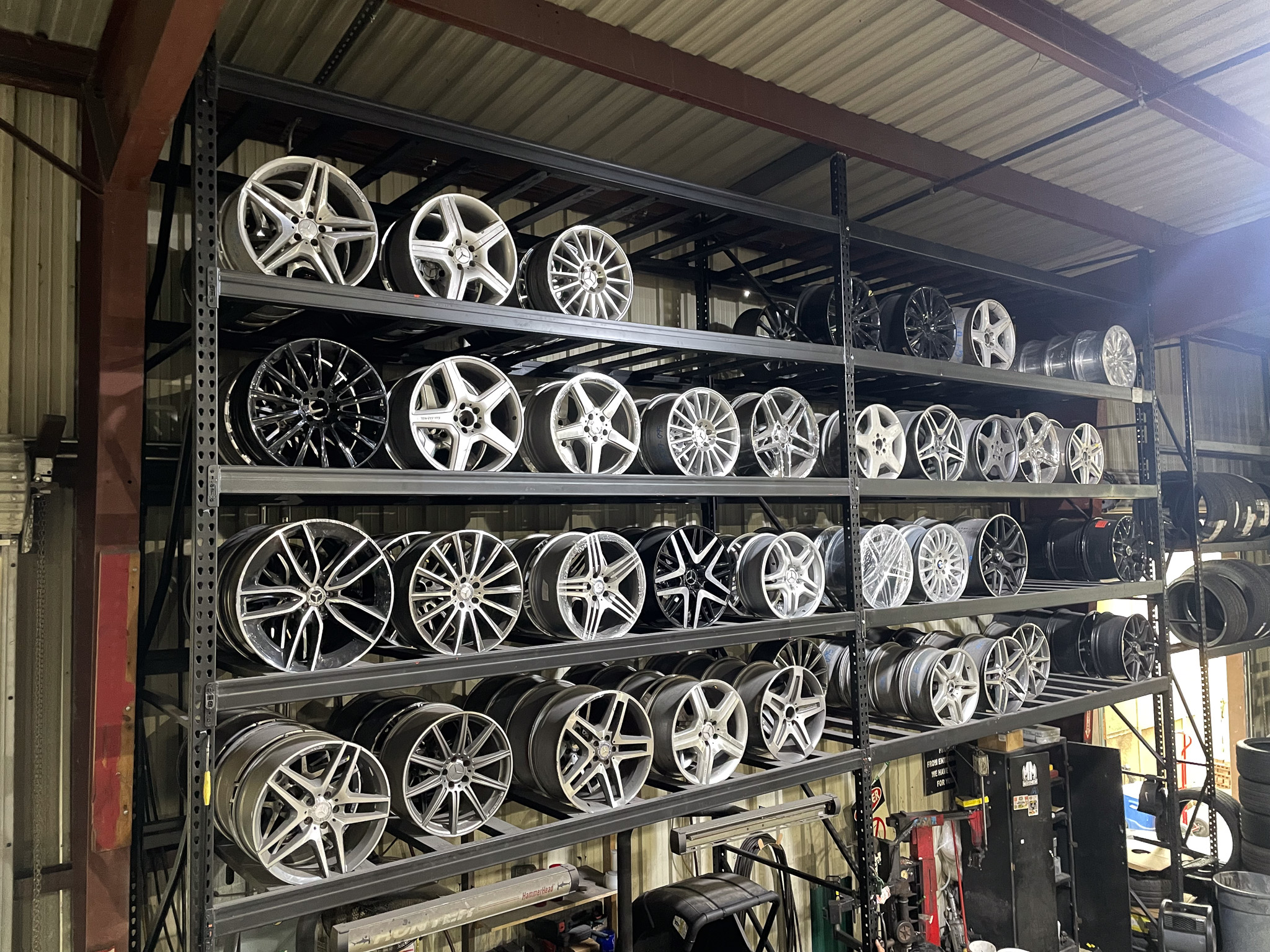 Image of floor to ceiling shelving filled with wheels.